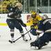 Michigan junior right wingman Derek DeBlois tries to score in the game against Notre Dame on Friday. Daniel Brenner I AnnArbor.com